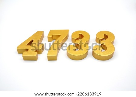    Number 4733 is made of gold-painted teak, 1 centimeter thick, placed on a white background to visualize it in 3D.                               