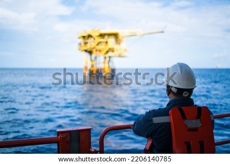 Offshore oil and gas wellhead remote platform which produced raw material for sent to onshore refinery, power generation and petrochemical industry. Royalty-Free Stock Photo #2206140785