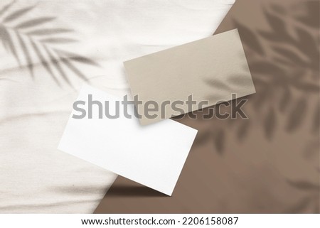  business card moukup paper.Square Paper Mockup with realistic shadows overlays leaf. Shadow Of A Tropical Plant.