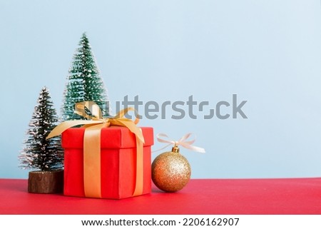Christmas composition. craft Gift box, small tree, branches and craft DIY decorations on white background. New year concept. Christmas home decoration Flat lay, top view, copy space.
