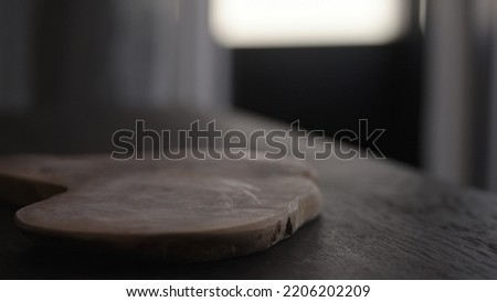 empty olive board on oak table, wide photo