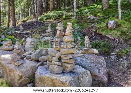 Little stone man on mountains