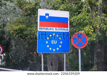 Border crossing between Croatia and Slovenia. Schengen Area. Slovenian and EU flag on road sign. Welcome to Slovenia. Traffic sign.   