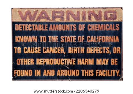 Warning sign. A metal sign warning about detectable amounts of Chemicals that can cause harm or even Death. Metal Warning Sign. Caution sign. 