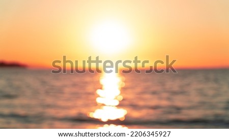 Blurry sunset photography. Blurry sunray background or wallpaper. Golden hour at sunset concept. Royalty-Free Stock Photo #2206345927