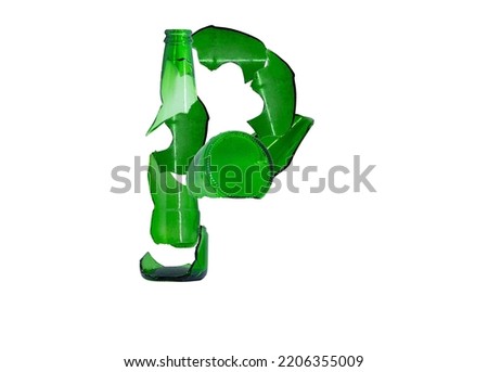 The letter P made from a broken bottle