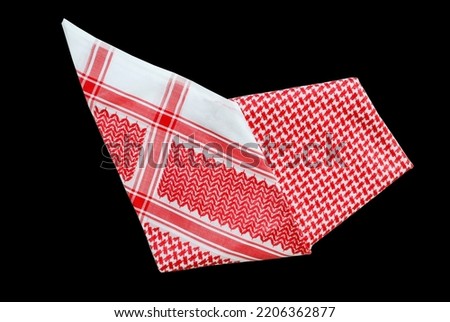 saudi men clothing accessory head scarf red shemagh closeup black background space for text luxury traditional Arabic men dressing Royalty-Free Stock Photo #2206362877