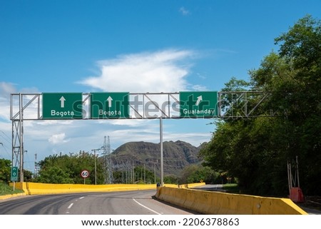 Highway signs pointing the direction to the city of Bogota. Colombia.