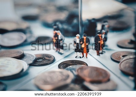 Miniature senior couple reflected in the mirror Royalty-Free Stock Photo #2206391939