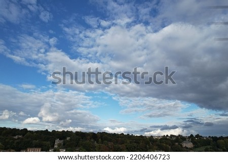 Beautiful and Dramatic Clouds at Sunset Time over British Countryside Landscape.