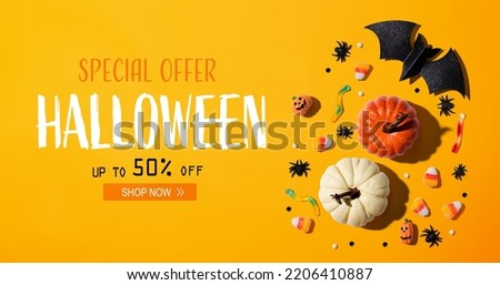 Halloween sale banner with Halloween decorations - flat lay