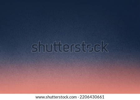 Dark navy blue color two tone gradation with light peach pink paint on recycled paper texture background with space