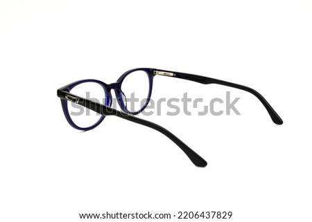 Frames Spectacle Photos. Glasses Black with blue Frame Isolated On White Stock Photo. Optical Spectacles Frame. Light weight. Spectacle frame and glasses. Spectacle Pictures  Royalty-Free Stock Photo #2206437829