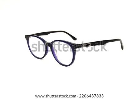 Frames Spectacle Photos. Glasses Black with blue Frame Isolated On White Stock Photo. Optical Spectacles Frame. Light weight. Spectacle frame and glasses. Spectacle Pictures  Royalty-Free Stock Photo #2206437833