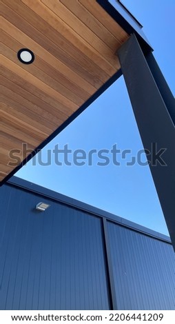Industrial Property front gate with blue sky