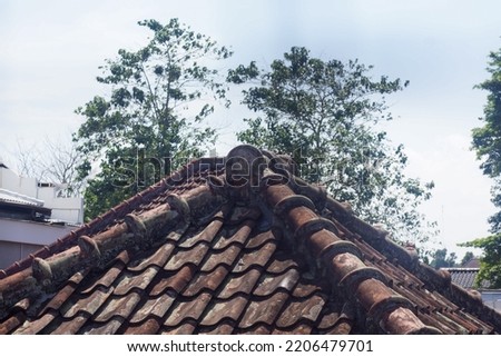 triangular building roof tile during the day