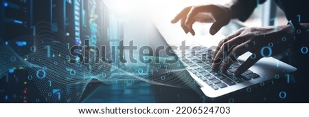 Data Processing, digital technology, internet network technology concept. Man computer programmer working on big data and computer code with data center, server room as backgrounds  Royalty-Free Stock Photo #2206524703