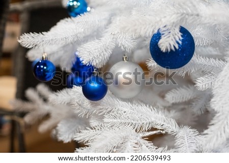 Close up of balls on christmas tree. background New Year concept.
