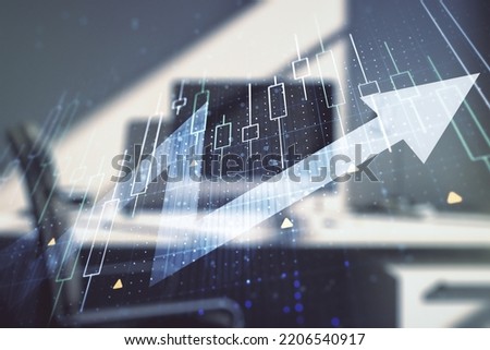 Double exposure of abstract creative financial diagram with upward arrow and modern desk with computer on background, growth and development concept