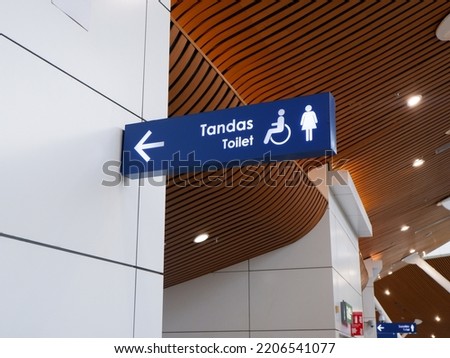 Direction sign of washroom blue colour 