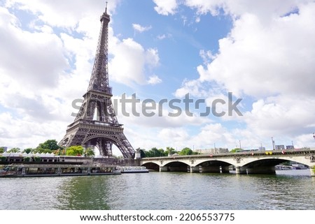 The Eiffel Tower and Pont d'Iena bridge on the Seine in Paris, France Royalty-Free Stock Photo #2206553775