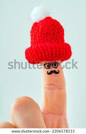 funny finger character in hat