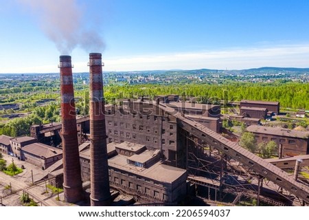 Smokestacks of an sinter factory. View from above Royalty-Free Stock Photo #2206594037