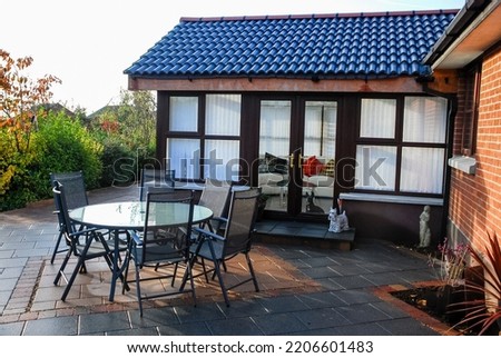 Modern sunroom and patio table.