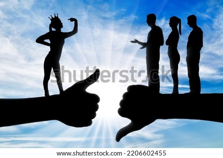 Selfishness. An arrogant selfish woman with a crown who thinks she is better than other people. Concept of egoism, arrogance and narcissism. Silhouette Royalty-Free Stock Photo #2206602455