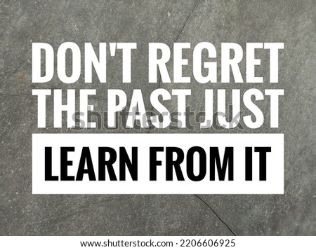 Inspirasional motivational quotes .dont regret the past just learn from it. On nature background.