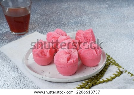 Kue mangkok or kue apem.steamed cupcakes or Fa Gao are special cakes during Chinese New Year celebrations.
 Fa Gao is believed to be a fortune cake. Royalty-Free Stock Photo #2206613737