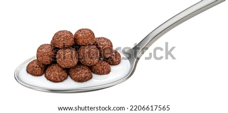 Chocolate corn balls with milk in spoon isolated on white background Royalty-Free Stock Photo #2206617565