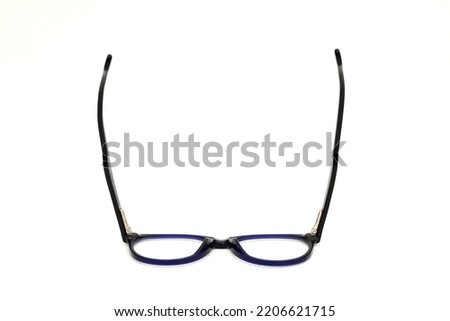 Frames Spectacle Photos. Glasses Black with blue Frame Isolated On White Stock Photo. Optical Spectacles Frame. Light weight. Spectacle frame and glasses. Spectacle Pictures  Royalty-Free Stock Photo #2206621715