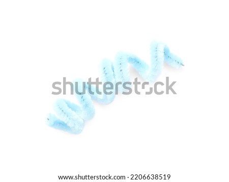 Light blue fluffy wire isolated on white, top view