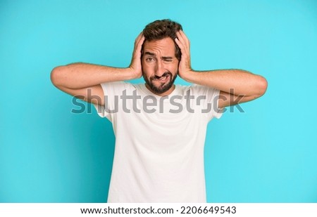 young crazy man feeling frustrated and annoyed, sick and tired of failure, fed-up with dull, boring tasks Royalty-Free Stock Photo #2206649543