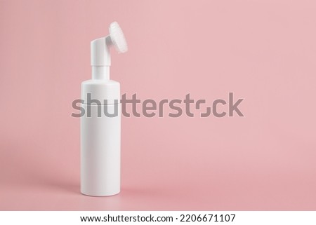 Facial skin care, skincare bottle, face wash with brush Royalty-Free Stock Photo #2206671107