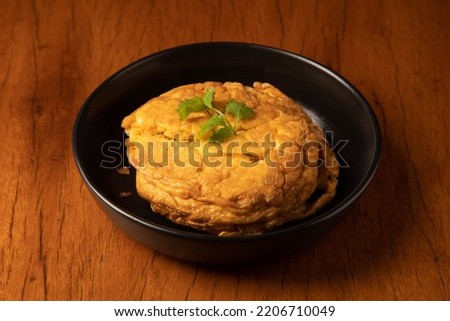 Crispy Omelet thai food It's a delicious omelette Royalty-Free Stock Photo #2206710049