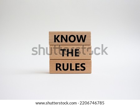 Know the rules symbol. Wooden blocks with words Know the rules. Beautiful white background. Business and Know the rules concept. Copy space.