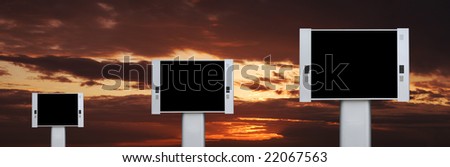 Blank advertising billboards with sunset sky background