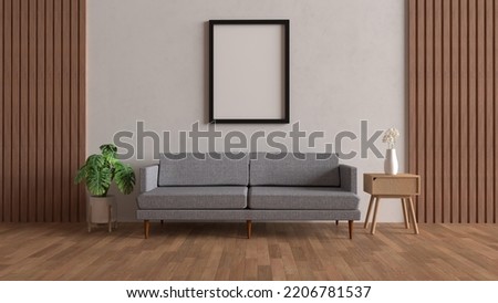 Interior mockup poster with black vertical frame and sofa on wooden flooring