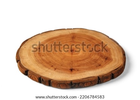 Wooden stand for a dish isolated on a white background. Tree trunk cut for product presentation demonstration. High angle isolated on white background Royalty-Free Stock Photo #2206784583