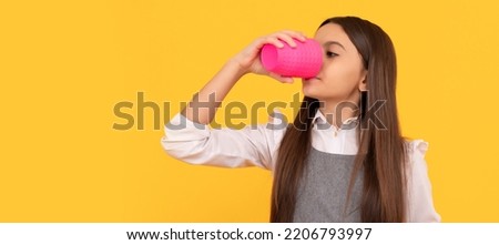 Thirsty girl child drink beverage from plastic cup holding advertising board for copy space, thirst. Horizontal poster design. Web banner header, copy space. Royalty-Free Stock Photo #2206793997