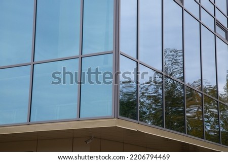 Tinting of windows on a large building.Window film for sun protection.