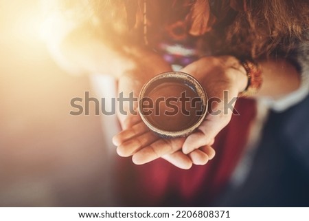 Cacao ceremony, heart opening medicine. Ceremony space. Cacao cup in woman's hand. Royalty-Free Stock Photo #2206808371
