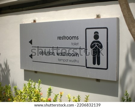 Restroom and ablution washroom sign