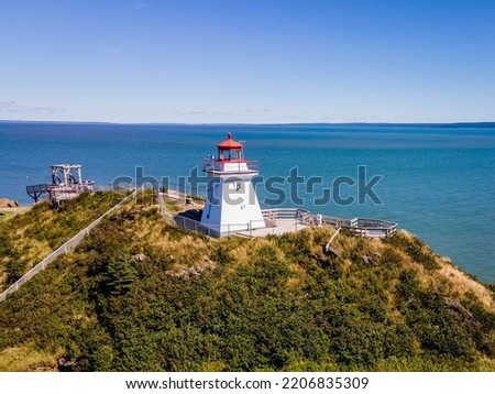Aerial view of Lighthouse at Fundy's Cape Enrage Fundy Biosphere Reserve in Canada Royalty-Free Stock Photo #2206835309