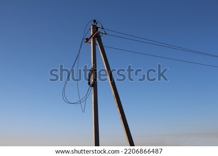 high-voltage wires for electric current on a pole power line