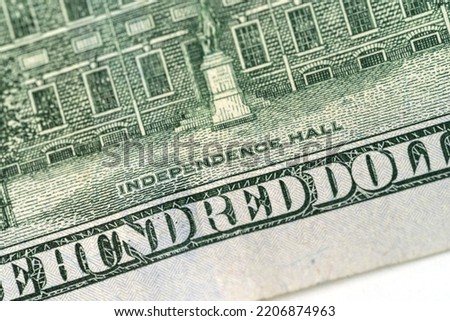 Close-up elements of dollar bills. Money, US dollar bills background. Paper money is scattered on the table. Photo for finance and economy concepts.
