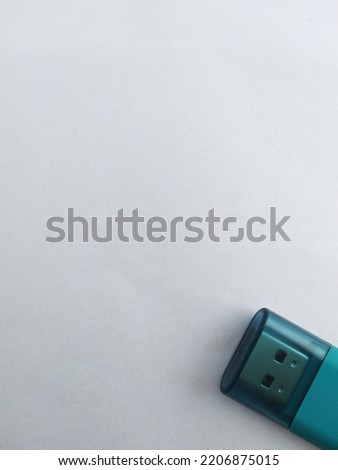 Blue flash disk on white background