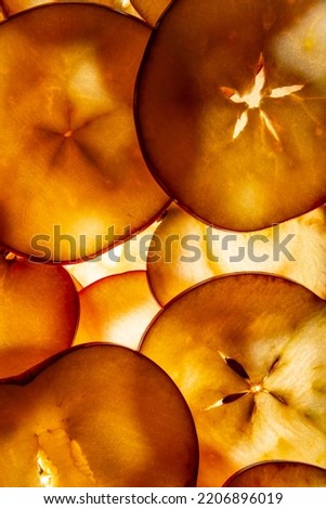 thin slices of apples on a white background - food background